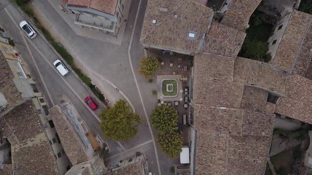 Aerial famous grignan street village in provence at sunrise from above france