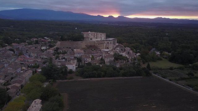 Aerial famous typical Grignan village in provence at sunrise from above france