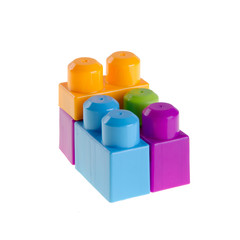 Naklejka premium Toy or Plastic building blocks on background new.