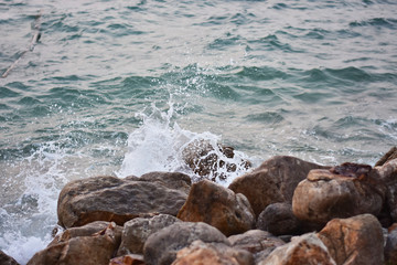 waves crashing on rocks