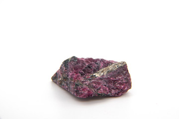 Natural rock specimen of eudialyte, a rarity minor gemstone, in nepheline syenite with crystals of...
