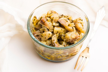 Herring salad with garlic, herbs and olive oil