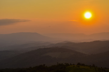 Fototapeta premium Sunset Sunrise in mountain landscape. Mountain sunset. Landscape. Mountains. Sunset. Beautuful sunset.