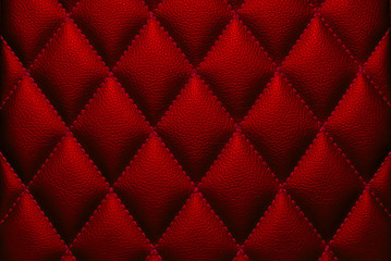 Fototapeta premium Texture of the red leather surface. Red leather background.