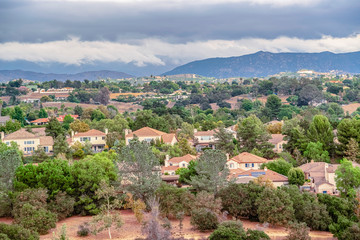 Fototapeta na wymiar Houses among green trees in Southern California