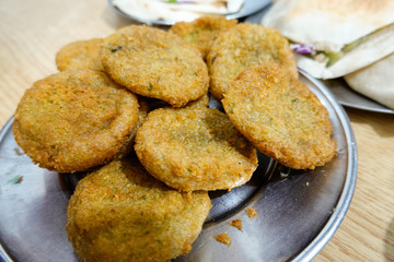 Cairo, Egypt, A plate of Egyptian Ta'ameya , like falafel, and pita bread sandwiches.
