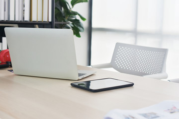 Laptop Computer Notebook on desk in office internet technology work online connection