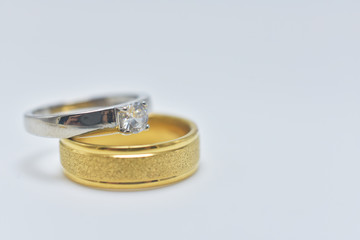 Golden wedding ring on white background,couple Love marry