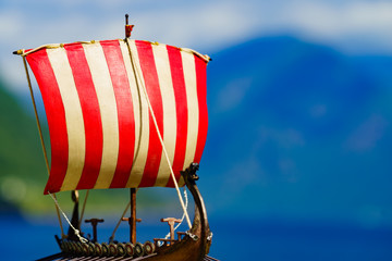 Viking boat on fjord shore, Norway