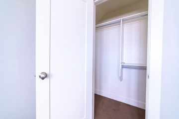 Empty clothing cupboard or wardrobe bright interior