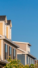 Vertical Row of upper floor facades of urban homes