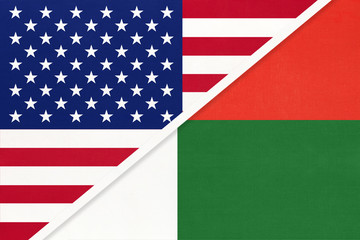 USA vs Madagascar national flag from textile. Relationship between two american and african countries.