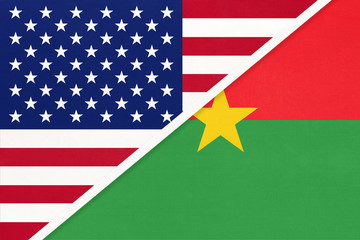 USA vs Burkina Faso national flag from textile. Relationship between two american and african countries.