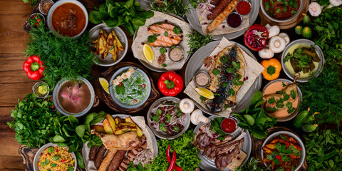 Traditional Georgian cuisine. Matzoon Okroshka, Khash Chikhirtma Harcho Soup, Dolma Chanakhi Chashululi Chkmeruli Kupati