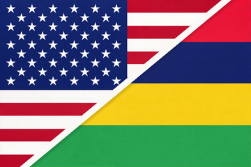 USA vs Mauritius national flag from textile. Relationship between two american and african countries.