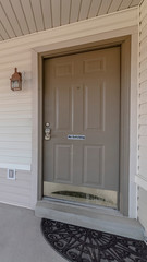 Vertical Covered front porch with grey and white decor