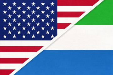 USA vs Sierra Leone national flag from textile. Relationship between two american and african countries.