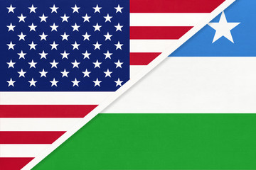 USA vs Puntland national flag from textile. Relationship between two american and african countries.
