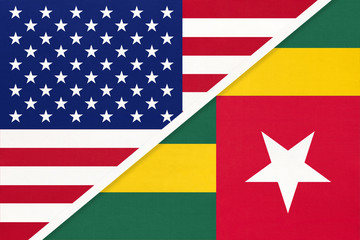 USA vs Togo national flag from textile. Relationship between two american and african countries.