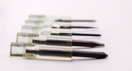 Screwdriver and phillips screwdriver toolkit all in one isolated on white background