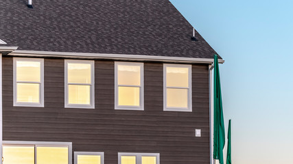 Panorama frame Sunlight reflecting on the windows of a house