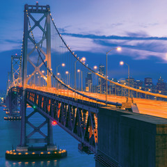 Fototapeta na wymiar Wonderful view from the height of Oakland Bridge in San Francisco after sunset