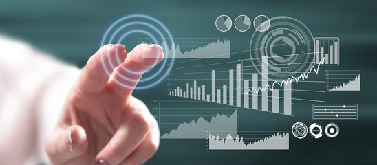 Woman touching a financial analysis concept