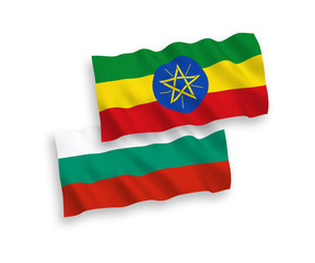 National vector fabric wave flags of Bulgaria and Ethiopia isolated on white background. 1 to 2 proportion.