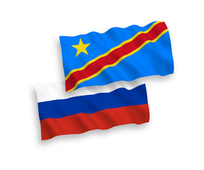 National vector fabric wave flags of Democratic Republic of the Congo and Russia isolated on white background. 1 to 2 proportion.