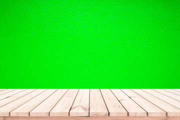wood plank with abstract green leather background for product display