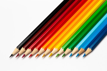Fototapeta premium Colorful wooden pencils on a white background