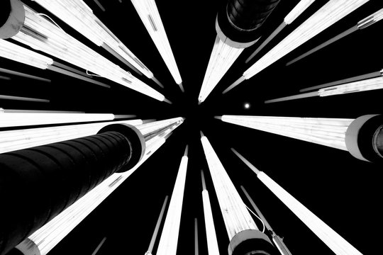 Parque de la Luz Medellin Colombia Park of many tall illuminated lamps, Black and white photography. Abstraction,