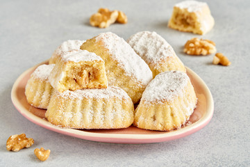 Sweet arabic pastries stuffed with walnuts . Traditional maamoul    cookies 