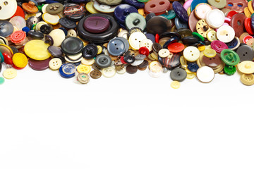 Group of colorful buttons on white background - Image