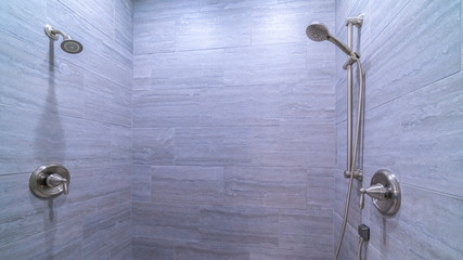 Panorama Tiled shower cubicle with dual heads bright interior