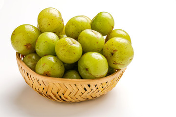 Fresh Indian gooseberry in wooden  bowl 