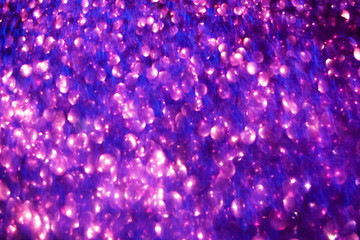 Color blirred glitter texture.  background with color metallic effects...