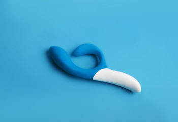 Silicone sex toys on a pink background. Erotic toy for fun. Sex gadget and masturbation device..
