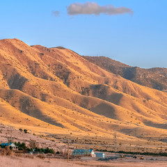 Fototapeta na wymiar Square Mountains along the Utah Valley in golden light