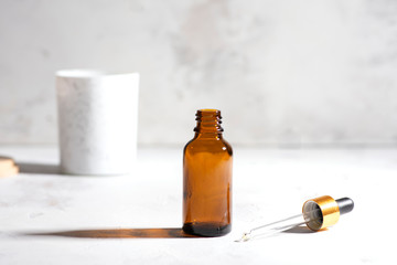 Vial of face serum essence for women. Beauty concept. High contrast