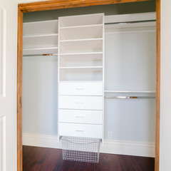 Square frame Empty shelves of a luxury walk-in closet