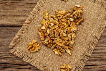 Sprinkled walnuts. Natural organic snack, healthy eating concept