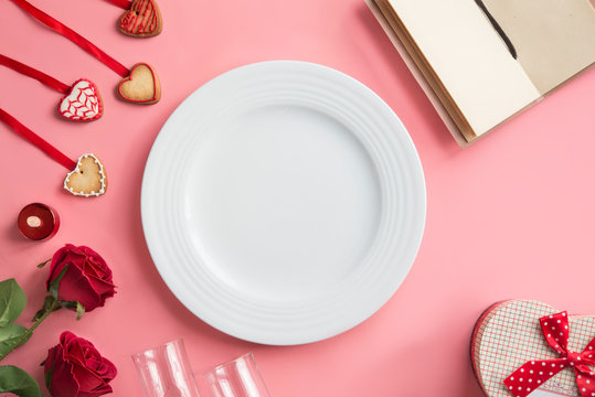 Valentines Day Dinner On Pink Background. View From Above.