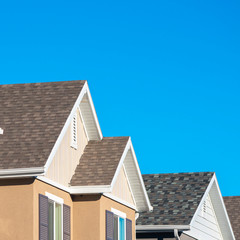 Square frame Row of upper floor house facades with shutters