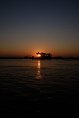 Obraz premium Sunset on the Zambesi river close to Victoria Falls, Zimbabwe