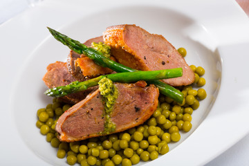 Grilled duck breast with vegetables