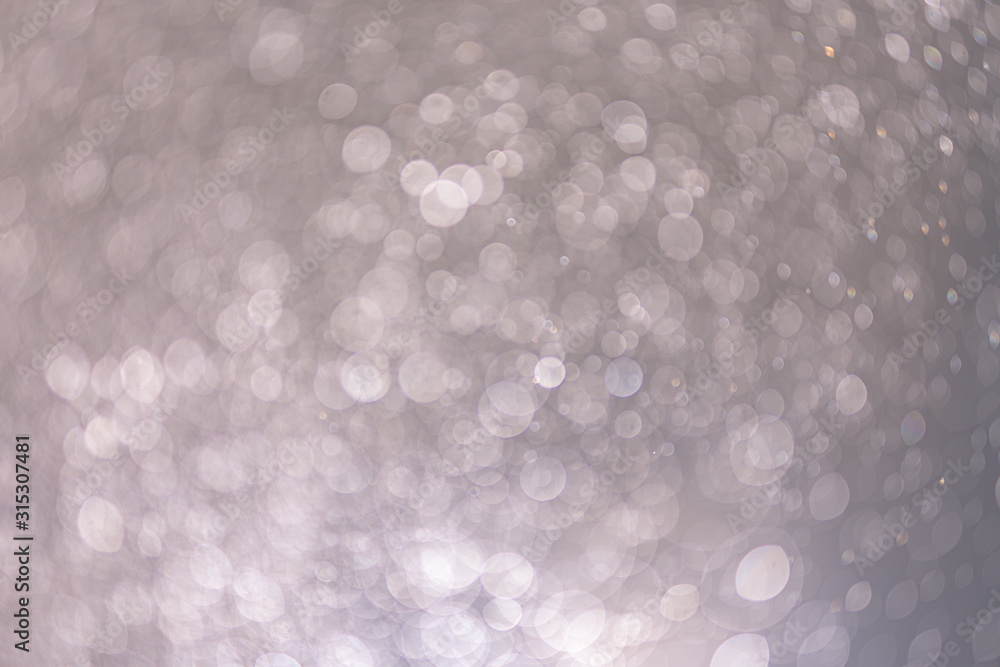 Poster abstract bokeh from light and water spray in backgrounds of various colors