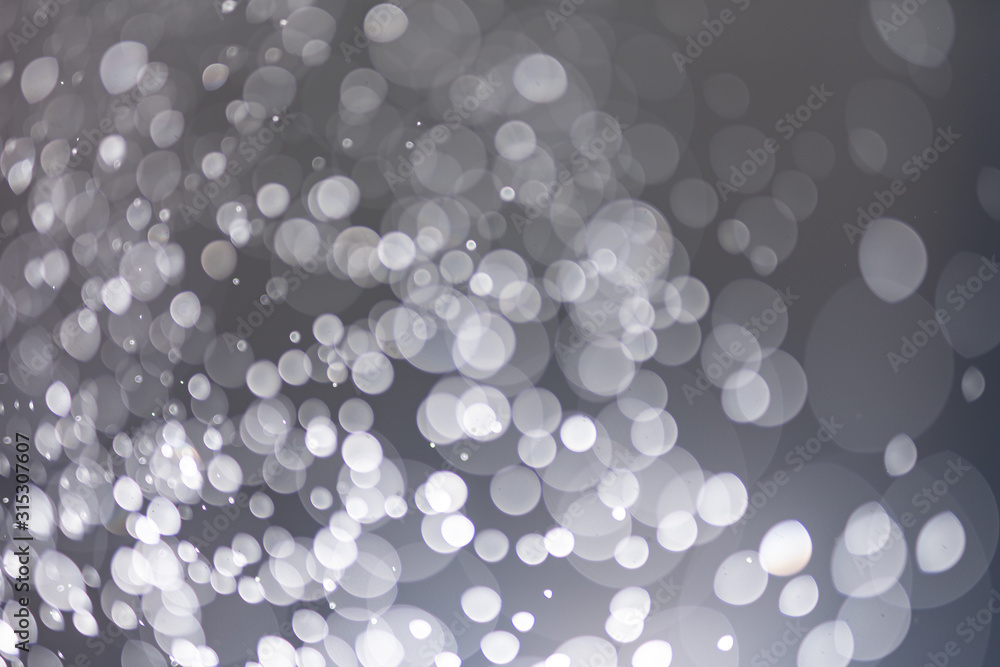 Poster abstract bokeh from light and water spray in backgrounds of various colors
