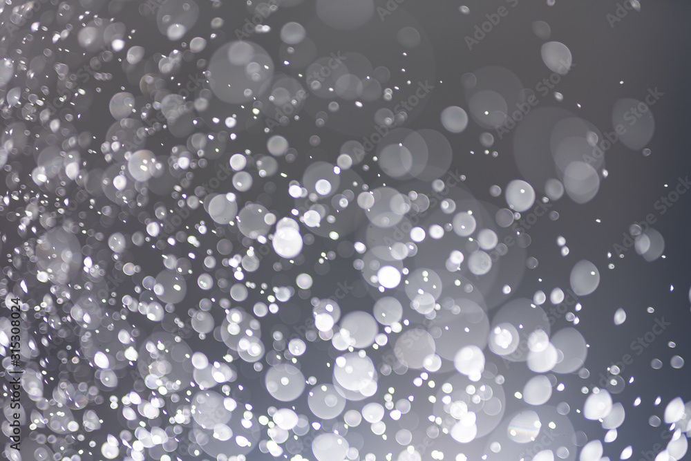 Poster abstract bokeh from light and water spray in backgrounds of various colors