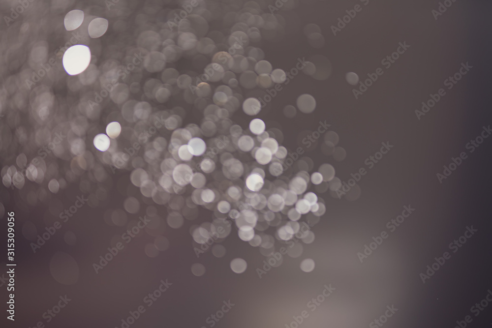 Poster abstract bokeh from light and water spray in backgrounds of various colors
